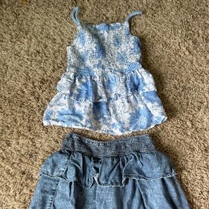 A ruffle shirt and a ruffle skort